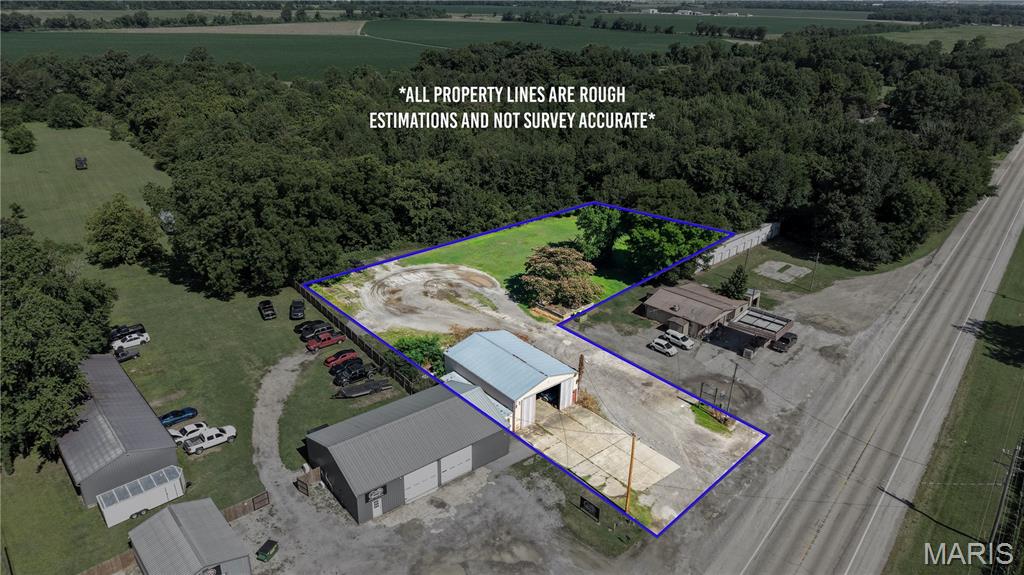 Prime Commercial Opportunity – 2,238 SF Shop with Excellent Visibility & Additional 1-Acre Lot

Take advantage of this commercial property featuring a 2,238-square-foot shop situated in a highly visible location with strong frontage and easy access. The versatile building offers ample space for a variety of business operations, including service, automotive, contractor, warehouse, or light industrial uses.

Adding significant value to the property is an additional one-acre lot, providing abundant room for expansion, equipment storage, vehicle parking, outdoor display areas, or future development opportunities. The property's prominent visibility ensures maximum exposure to passing traffic, making it an ideal location for businesses seeking a strong presence and convenient customer access.

Whether you're looking to expand your current operation, establish a new business location, or invest in a property with growth potential, this unique offering combines functionality, visibility, and additional land to meet a wide range of commercial or personal needs.
