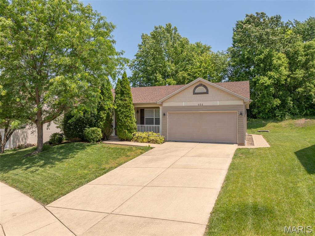 Welcome Home! Meticulously maintained Ranch offering 3 Bedrooms and main floor laundry. Covered front porch and mature landscaping greets you as you enter to find open floor plan with vaulted ceiling spanning through family and dining room. Kitchen provides plenty of cabinet/counter space with window above sink providing view of tree lined backyard. Main floor Laundry off Kitchen with room for additional storage. Primary Bedroom is vaulted with Full bath. 2 additional bedrooms are decently sized and adjacent to 2nd full bath. Basement provides plenty of room for additional storage. Nice Level Lot backing to trees is low maintenance with irrigation system. New Roof installed 2025. Refrigerator, Washer and Dryer included. Schedule your appointment today. Won't last long!