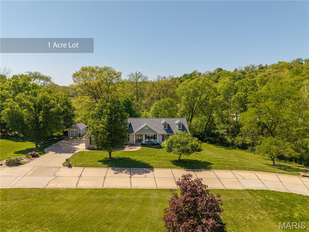 This is truly a rare opportunity to purchase a spacious great room ranch (3,800 sq ft), nestled on 1 acre in the desirable Old Mill Estates community. The combination of outdoor/indoor living space, privacy, and home features is unmatched in the current market. 6803 Autumn Cove welcomes you with a covered porch and an open great room, and impresses throughout. The huge great room offers abundant natural light, cathedral ceilings, a cozy fireplace, and connects to the kitchen. The kitchen features ample cabinet space, solid-surface countertops, a pantry, a breakfast room, and it walks out to a massive, two-tiered composite deck, reinforced for the addition of a 3- or 4-season room. The deck overlooks a park-like backyard, with a creek, beautiful landscaping, patio, and fencing. Backyard also features a well-built shed and under-deck storage. The main level features a separate dining room, a half bathroom, and a large primary suite. The primary suite features a full bathroom with a soaking tub, a separate shower, double sinks, and two walk-in closets. The full, finished basement features a 4th bedroom with a full bathroom, a walkout to the stunning backyard, storage, and a massive recreation area with a wet bar. Home also features a main-floor laundry, a 3-car, oversized, side-entry garage, with an additional 8ft x 12ft work area, and ample parking. Located in the desirable Old Mill Estates community. A community built by an extremely respected builder, with every home built on 1+ acre lots. Homes are all well-built and offer room between neighbors. The community has a private feeling, but it has a convenient location. This is a must-see!