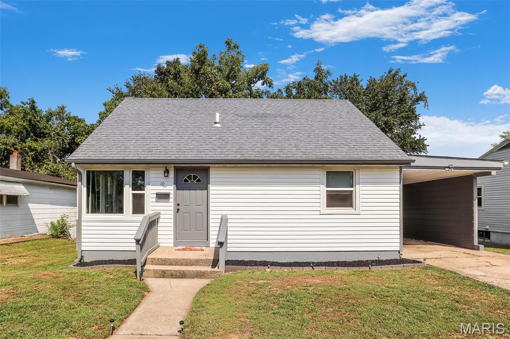 Move-in ready and tucked away on a dead-end street in the city limits of Fredericktown! This 3 bedroom, 1 bath home offers a great location away from main road traffic while still being close to everything town has to offer. Inside, you'll find a large living room, kitchen with plenty of cabinet space, and a main-floor bedroom with a full bath featuring a new vanity. Upstairs offers two additional spacious bedrooms. Recent exterior improvements include new siding and gutters in 2025, fresh landscaping, and upgrades to the carport. The home also features central HVAC and an unfinished basement offering additional storage space. A well-maintained, move-in ready home in a convenient Fredericktown location!