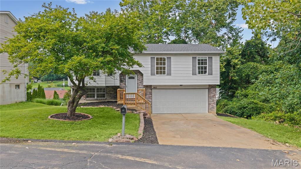 ***Price Improvement ***   This beautifully refreshed 3-bedroom, 3-bathroom home offers a long list of updates and an inviting outdoor oasis. Step inside to find new laminate hardwood flooring throughout the home, fresh paint, and new baseboards, creating a clean and updated feel from room to room. All three full bathrooms have been updated, while major mechanical updates include a new furnace (2021) and new A/C unit (2021). The home also features a new roof (2026) & some new siding, providing added peace of mind for years to come.

The spacious main level offers an open and functional layout with vaulted ceilings, an eat-in kitchen with custom cabinetry and pantry, and plenty of natural light. The partially finished walk-out lower level provides additional living space and a full bathroom, offering flexibility for a family room, recreation area, home office, or guests.

Outside is where this home truly shines! Enjoy your own private backyard retreat featuring a large above-ground pool, perfect for summer entertaining, relaxing, and making memories with family and friends. Pool has a new liner (2023) , new padding (2023), new pump (2026), & new filter (2025) The spacious deck provides plenty of room for outdoor seating and gatherings, while the tree-lined backdrop adds privacy and a peaceful setting. An oversized 2-car attached garage provides convenient parking and additional storage.

The seller has an 2.87% assumable loan.  

With extensive updates inside and out, a fantastic pool area, and a desirable location in Cardinal Terrace, this home is ready for its next owner.