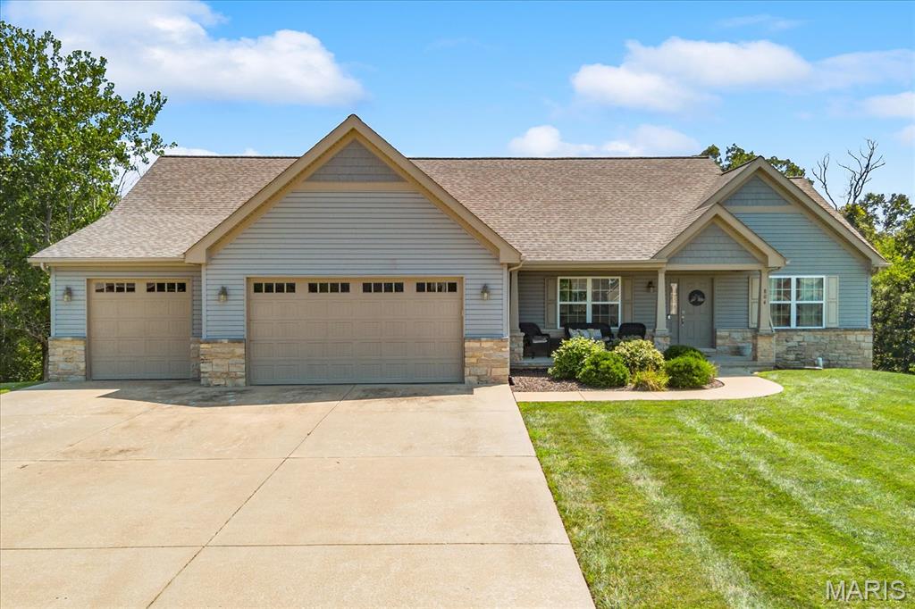 Your own private retreat awaits in the heart of Columbia’s desirable Briar Lake neighborhood! This 4 bed 3 bath ranch is perched on an elevated lot with a tree-lined backdrop, this home combines a sought-after location with incredible indoor and outdoor living—including an oversized 3-car garage, walkout lower level and gorgeous in-ground pool.

Inside, vaulted ceilings and natural light create an open, airy feel, complemented by hardwood flooring throughout the main living areas and a wood-burning fireplace. The spacious kitchen features 42" cabinetry, granite countertops, stainless steel appliances, breakfast bar, pantry and an adjoining dining area overlooking the covered deck and backyard.

The primary suite offers an impressive walk-in closet and private bath with dual vanities, oversized shower and separate tub. The partially finished walkout lower level adds even more living space with a family room, 4th bedroom, full bath and direct access to the patio, fenced yard and pool area.

From summer days spent poolside to evenings on the covered deck enjoying the peaceful wooded backdrop and beautiful sunsets, this home offers an incredible setting in one of Columbia's desirable established neighborhoods. More photos and details coming soon!
