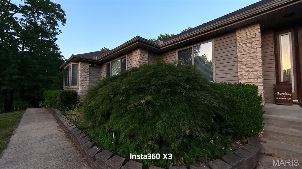 Executive Home on Hill Top Setting Just Outside of Town. Close to the Municipal Golf Course. Sits on 1.72 Acres—fenced rod iron back yard. Large Living Room with double-tray ceiling and can-lighting. Kitchen and Dining Room with tray ceiling. Country Kitchen with lots of Cabinets and Counter Space for Cooking! Large back deck partially covered. Fenced back yard for your children or fur baby! Indirect lighting—Bay Window - ADA accessible. Recessed light in double tray ceiling in the Living Room, LED 5/23. This home has a handicap shower/bars and a seat. 36'' doors, wheelchair ready. NO shelving stays in the garage. Soaking tub and Shower with a large walk-in closet. New flooring, Pantry, pull-out drawers, and generator backup. New Metal Storage shed with double lofts. This one is move-in ready! Sits on a dead-end road for lots of privacy, with all the conveniences.