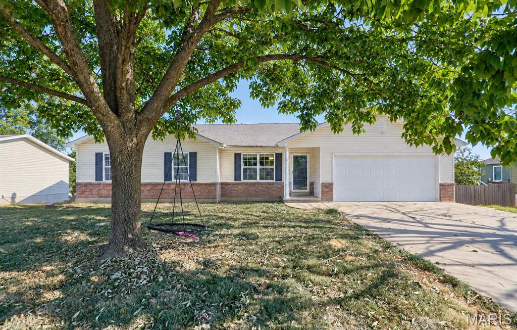 NO HOA, a finished basement, and a large fenced backyard- all in the heart of Troy!  This 3 bedroom , 2 bathroom house checks all the boxes with an open concept layout that makes everyday living and entertaining a breeze.  Step inside to a bright, open-concept floor plan featuring a large living room. The spacious kitchen, refrigerator stays, flows seamlessly into the living area and features a center island with plenty of room for gathering, meal prep, and casual dining. The primary bedroom offers it's own private ensuite bath, creating a comfortable retreat. Two additional bedrooms and full hall bath provide plenty of flexibility for family or guests.  The main floor laundry adds everyday convenience.  Head downstairs to the finished basement that is perfect for a rec room, home office, or gym.  Outside you will find a large fenced backyard with a deck that is perfect for grilling or drinking your morning coffee. The 2 car attached garage provides plenty of parking and space for storage.  Great space, a fantastic location and NO HOA- this one is ready to welcome you home.