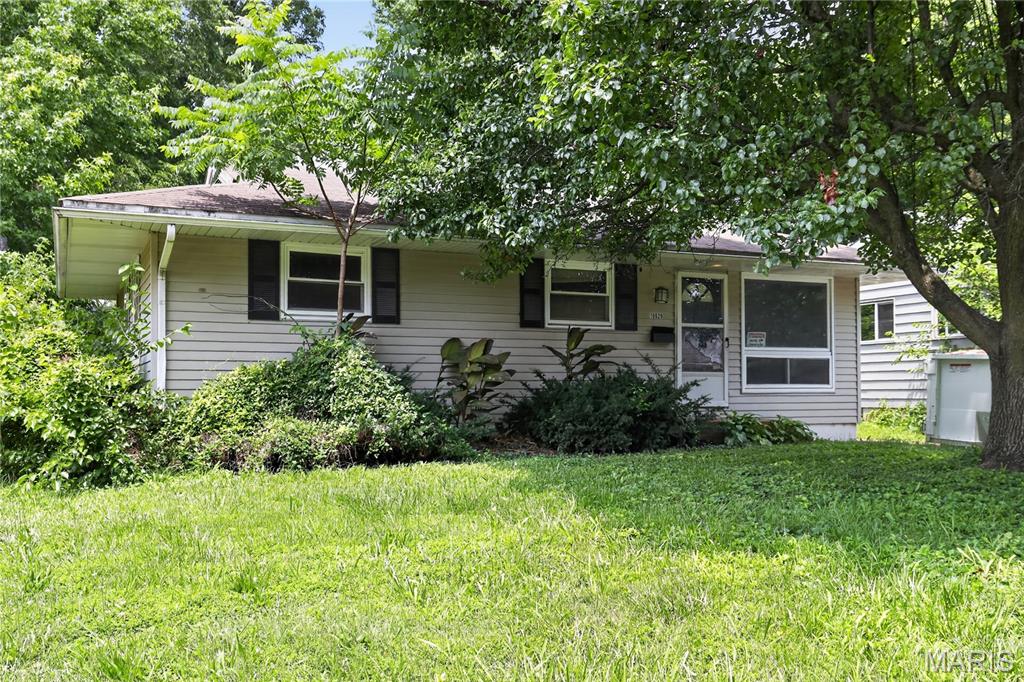 Charming 3-bedroom, 1-bath ranch-style home situated on a spacious lot in an established neighborhood of North St. Louis County. This home offers approximately 927 square feet of living space with a functional floor plan designed for comfortable everyday living. The main level features a bright living area, an efficient kitchen, and well-sized bedrooms. A full basement provides additional storage space and potential for future customization. The large backyard offers plenty of room for outdoor activities, gardening, or entertaining. Conveniently located near parks, schools, shopping, dining, and major commuter routes, this property provides easy access to everyday amenities.