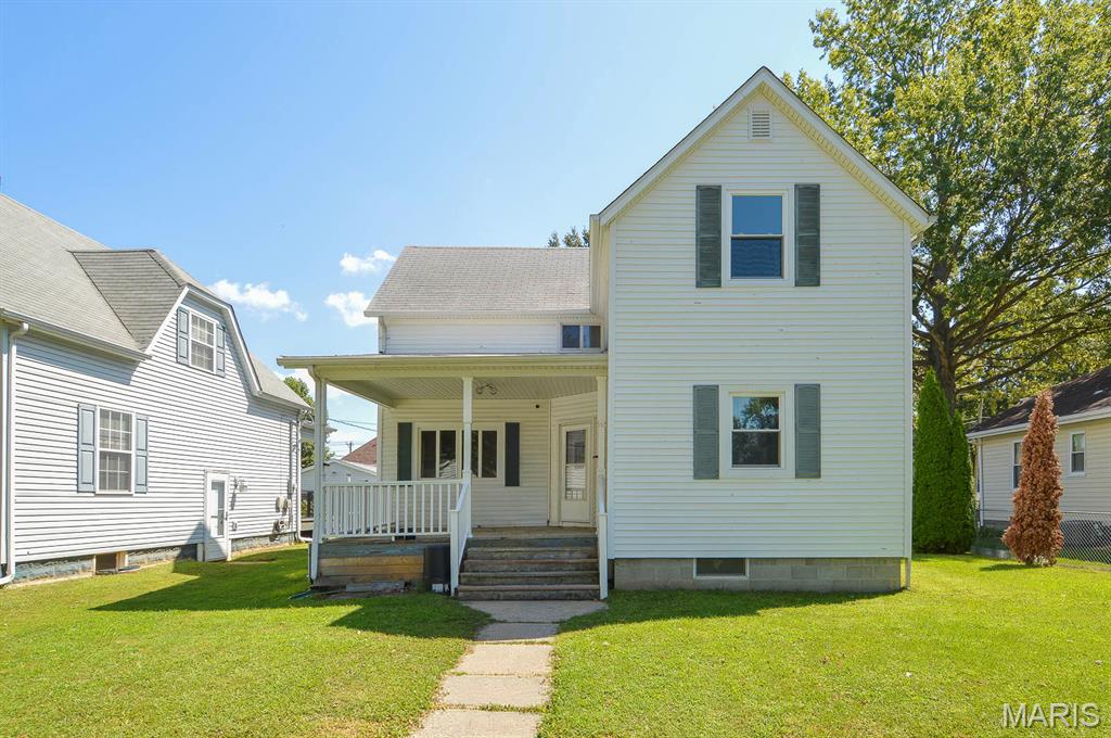 Price listed is Starting Bid Only. Bidding starts closing 9/30/2026 @ 5 p.m. Opportunity awaits with this potential-filled 4BR/2BA single-family home situated within an established Highland, IL neighborhood near parks, schools and local amenities! The spacious layout offers a full basement, detached garage and plenty of room to make the property your own. The front entrance opens into a generously sized living room filled with natural light. The main-level primary bedroom is conveniently located next to the combined family and dining room, which flows into the large kitchen featuring a cozy breakfast nook. A full bathroom and additional storage area are conveniently located near the kitchen. The upper-level houses three additional bedrooms, along with an unfinished room that offers the potential to be completed and used as a fifth bedroom, office or flex space. These rooms share a 3/4 bathroom. The full, unfinished basement provides exterior walk-up access and houses the home’s utilities, along with washer and dryer hookups. Outside, enjoy the mature neighborhood views from the large covered front porch or entertain guests on the concrete patio overlooking the fully fenced backyard. A detached single-car garage with a poured concrete driveway provides additional parking and storage. With its spacious floor plan, flexible living spaces and desirable Highland location, this property presents an excellent opportunity for an owner-occupant, investor or savvy renovator.  Property will sell under auction terms and be sold AS- IS, WHERE-IS. Seller, will not make any repairs as a result of any building, occupancy, or environmental inspections. Buyer will be required to sign an Auction Purchase & Sale Agreement if final bid is accepted by Sellers.
