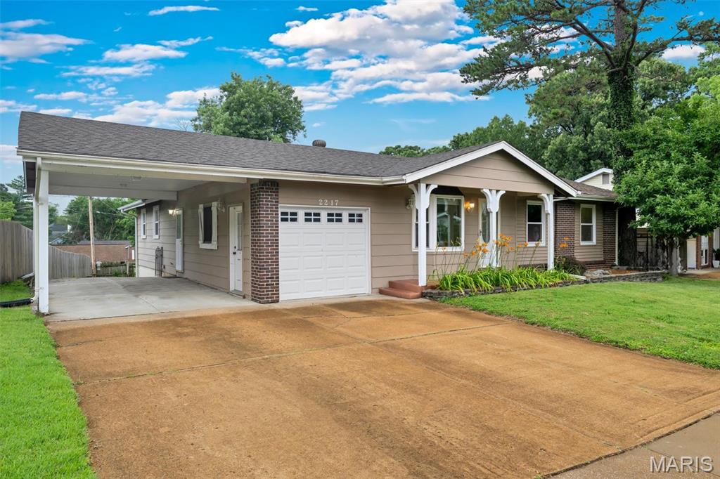 Stunning 1500+sqft 3 bedroom 2 full bathroom home located within Rockwood School District, so many features!!! The home features an updated open concept kitchen with custom cabnetry, island, and granite counter tops. The kitchen and dining are combined making it a perfect home for entertaining. The living room area off the back of the home expands the entertaining area even more; kick back and enjoy the gas fireplace, or venture to the back deck that leads to the backyard.  The home has 3 bedrooms, 2 located on the mainfloor. The Primary bedroom is very spacious with a picture window looking over the backyard; second bedroom is on the mainfloor; third bedroom in the lower level with a picture window overlooking the backyard. This home has 2 full bathrooms that have been recently updated.  In the lower level is fabulous recreational area for additional living space. A key feature that is fabulous for this home is the additional workshop area that spands the underneath addition of the Living room. The subdivision has 30+/- acres of common ground with multiple subdivision parks. Don't miss out on this stunning home!