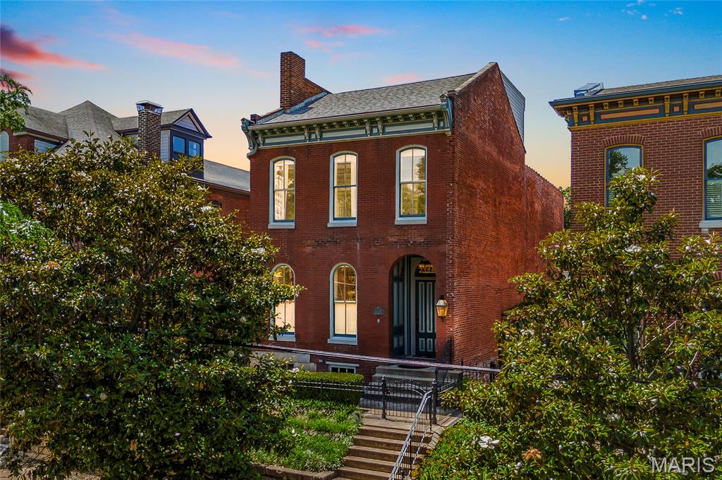 Featured on "This Old House," this beautiful home features updates throughout while still maintaining the character you love in city homes! Located just steps from everything Lafayette Square has to offer, over 4000 sq ft of living space awaits you. The main level features abundant space in both the living room and dining room. Chefs will love the ample space the updated kitchen provides. The kitchen leads to a wonderful backyard, featuring deck, detached garage, and hot tub! Perfect for entertaining! Back in the house, as we make our way upstairs, you'll find the primary suite, featuring a large closet, walk out to the second floor balcony, and updated primary bath. Rounding out the second level are two more spacious bedrooms, hall bathroom, and conveniently located laundry. No more trips to the basement! The finished third floor, offers great versatility in either an extra bedroom, perfect home office, or just another hang out space. The lower level features an additional half-bath and built in bar. Along with this amazing home comes the chance to transfer a membership for the much sought after Lafayette Square Bath and Tennis Club. Skip the wait list while enjoying a beautiful home!