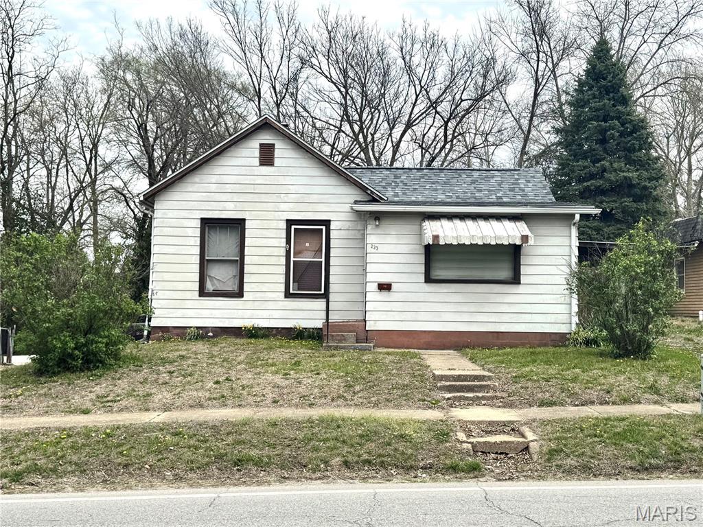 Great opportunity for investors or those looking for their next flip. This property offers strong potential as a rental or renovation project and is priced with updates in mind. A covered carport provides versatile space for parking, outdoor entertaining, grilling, or additional storage and opens nicely to the backyard.

The kitchen includes a stove and refrigerator and is ready for remodeling due to prior water damage, while the roof was replaced in 2024, offering added peace of mind. The main living areas flow easily into a combined dining and living room space, creating a functional layout.

Just off the dining area is a den that has previously been used as a second bedroom. This space includes access to the basement but does not have a closet or door for privacy. The home also features one full bathroom and a primary bedroom.

Conveniently located just a few blocks from downtown, the courthouse, and the Abraham Lincoln statue, this property combines location with investment potential. Bring your vision and make it your next successful project!