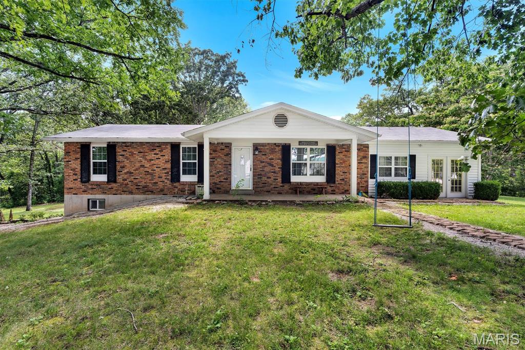 Looking for a private setting on just over 2 acres with a cute ranch home? Look no further. This house features 3 bedrooms and 2 full baths on the main level. Walk in to a large dinning room that leads you into the over sized living room, perfect for entertaining. Just around the corner is the kicthen that opens up to the back yard! The basement is finished with a sleeping room, laundry room, open entertainment space and wet bar area leading to your walk out patio with a view of the large yard. The 2 acres are open and beautiful with a small pond at the back of the property! Call today for more details.