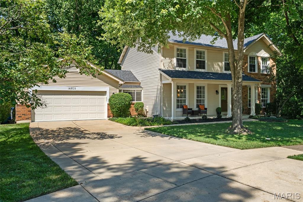 Tucked away at the end of a quiet cul-de-sac, this beautifully updated two story home offers the privacy, comfort, and lifestyle today’s buyers are searching for. Backing to mature woods in the highly acclaimed Parkway School District, this 4 bedroom, 2.5 bath home blends timeless design with thoughtful updates in an exceptional Chesterfield location. A soaring two story foyer welcomes you inside, setting the tone for the spacious, light-filled interior. At the heart of the home, the renovated kitchen (2019) features updated flooring that continues into the laundry room and powder room, creating a fresh, cohesive feel. Whether hosting holidays or enjoying casual family dinners, the kitchen flows effortlessly into the expansive living room, where a wood-burning fireplace flanked by custom built-in bookshelves creates the perfect gathering space. Step outside to the oversized screened porch and adjoining deck, where peaceful wooded views provide a private backdrop for morning coffee, summer dinners, or relaxing evenings surrounded by nature. Upstairs, hardwood floors extend throughout all four generously sized bedrooms. The spacious primary suite is a true retreat, highlighted by a beautifully renovated spa-inspired bath (2021) featuring a double vanity, soaking tub, separate walk-in shower, and large walk-in closet. Three additional bedrooms offer flexibility for family, guests, or a home office. The walkout lower level provides abundant storage and endless possibilities for future living and entertaining space. Convenient main-floor laundry, an attached 2 car garage, quick access to I-64, nearby shopping and dining, and an unbeatable location complete the package. More than just a home, this is a place to slow down, entertain with ease, and enjoy the beauty of every season in one of Chesterfield’s most desirable settings.