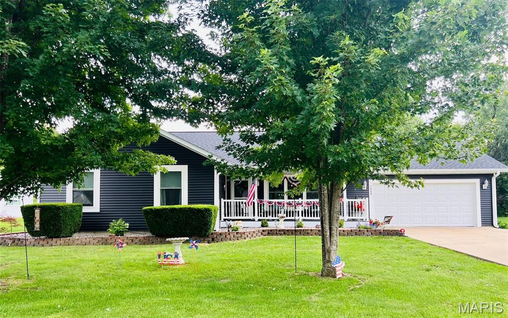 Charming Ranch-Style Home in Macon, MO Move-in ready ranch-style home combining modern functionality, premium upgrades, and exceptional outdoor living spaces.
Key Interior & Parking Features
* Spacious Layout: Desirable open floor plan designed for seamless living and effortless entertaining. Lovely large great room.
* Premium Flooring: Beautiful, durable hardwood flooring flows continuously throughout the entire main level.
* Bedrooms & Bathrooms: Three comfortable bedrooms with large closets and two full, well-appointed bathrooms.
* Ample Parking & Storage: Features a highly desirable attached, oversized 2-car garage with plenty of space for vehicles, a workshop, or extra gear.
* Bonus Square Footage: A partially finished basement offers excellent potential for a family room, home gym, office, or extra storage.
Exceptional Outdoor Living
* Curb Appeal: Professionally designed landscaping welcomes you to the property.
* Relaxing Porch: A welcoming covered front porch provides the perfect spot for your morning coffee.
* Private Retreat: A covered rear deck allows for comfortable outdoor dining and relaxation regardless of the weather.
* Low-Maintenance Luxury: An integrated maintenance-free decking area ensures maximum enjoyment with zero upkeep.
* Green Thumb Ready: Multiple raised garden beds are established and ready for your favorite vegetables, herbs, or flowers.