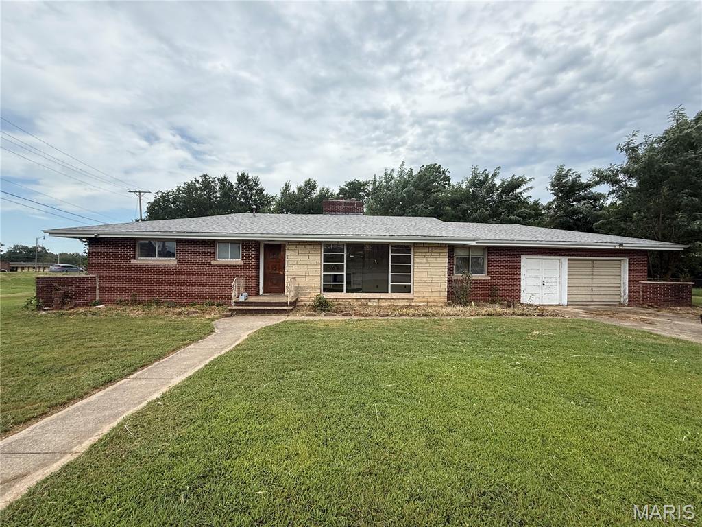 Opportunity awaits with this 2-bedroom, 1-bath brick home situated on a large corner lot in the city! This fixer-upper is ready for someone with a vision to bring it back to life. With its solid brick exterior and manageable layout, the home offers plenty of potential for an investor or buyer looking to create a space of their own. The large corner lot provides ample room to enjoy the outdoor area.  Great location. Whether you're looking for your next renovation project, investment property, or a location with  potential, this property offers plenty of possibilities! Priced to sell -  Buyer and buyer’s agent to perform their own due diligence. Home is sold AS IS.