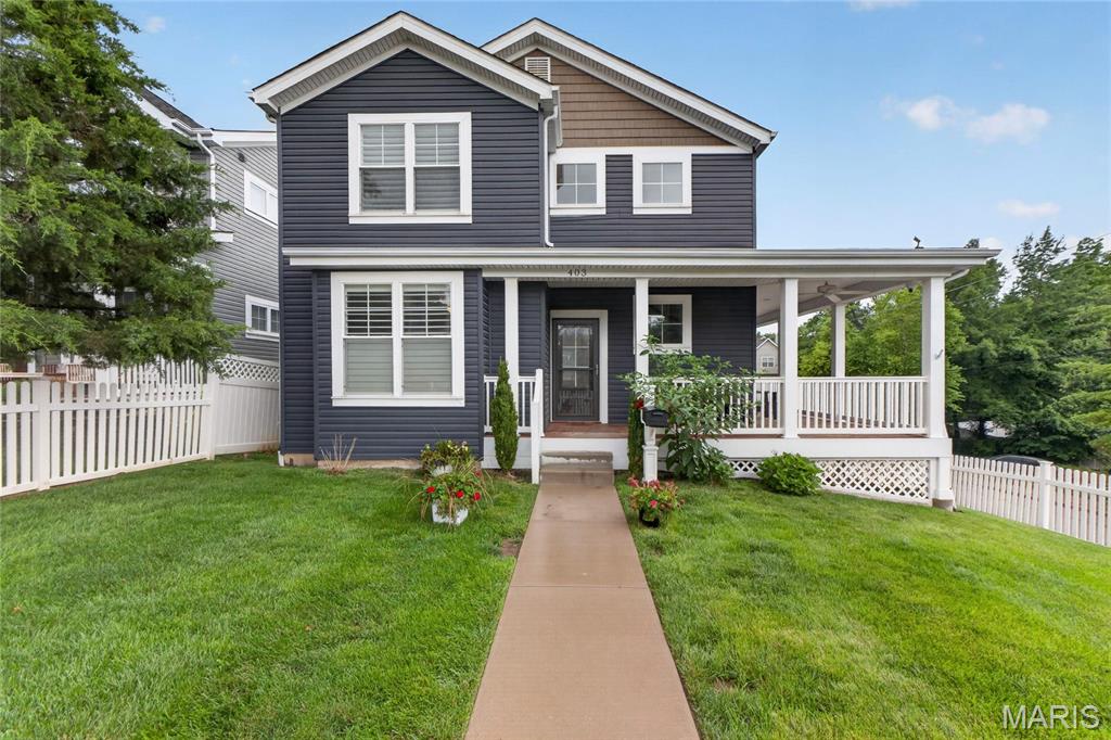 Quintessential Kirkwood Living with Expansive Wrap Around Porch. “Newer” 5 Bedroom Home was built in 2017. All the convenience and benefit of newer construction without the wait time. Wood floors throughout first level living spaces. Main Floor Primary Suite with plantation shutters and two walk in closets.  Primary bath with dual vanities and glass encased shower with floor to ceiling tile.  Center island in kitchen w/ granite tops, backsplash, and stainless steel appliances. Large walk in pantry.  Breakfast room with bay window walks out to rear deck.  Main floor laundry. Vaulted Ceiling in Spacious Family Room with gas fireplace adjoins separate dining room.  One en-suite bedrooms upstairs off loft area.  Two other beds for the family with add’l hall full bath. Finished Walk out Lower level with library with extensive built in bookshelves and full bath. Rec Room with beverage station, gas fireplace, and 2nd FULL bath is great place for the kids to play and watch movies. Detached, oversized 2 car garage at rear of property.  Yard with vinyl fence is perfect for the dog! Wrap Around Deck is amazing place to sit and Enjoy 4th of July fireworks! Expansive floor plan with over 3,300 total living space. Convenient Kirkwood location close to parks, schools, and downtown KWD!