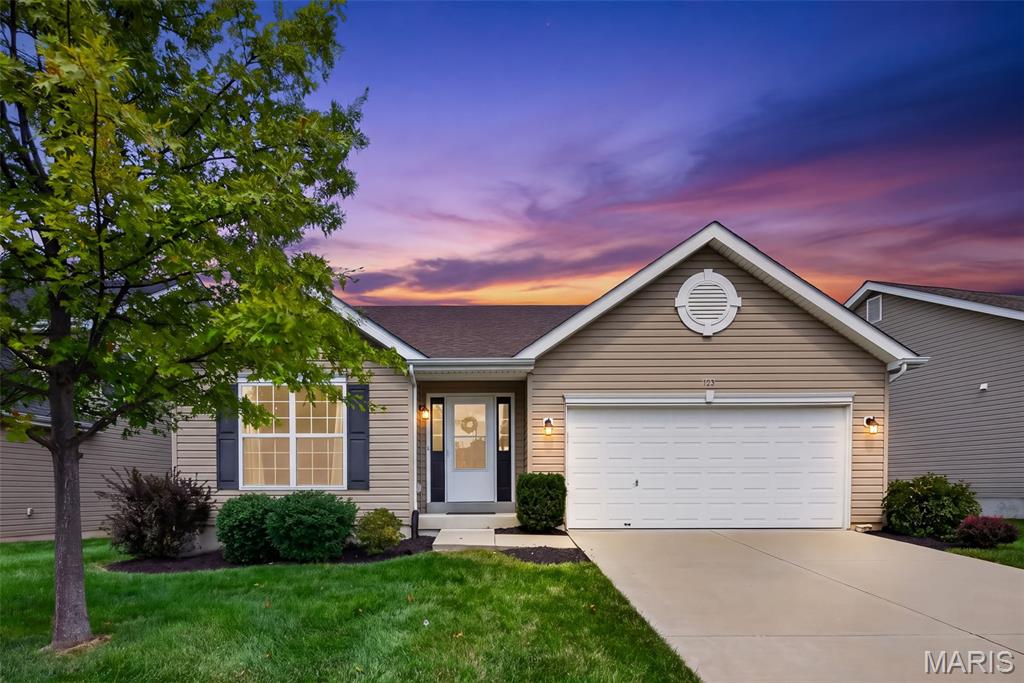 Welcome home to this incredible 4-bedroom, 3-full bathroom ranch in the sought-after Wyndgate subdivision! Step inside and be wowed by the soaring vaulted ceilings and inviting open floor plan. The spacious living room flows seamlessly into the large kitchen, creating the perfect space for everyday living and entertaining. The main level features durable, stylish LVP flooring throughout. The beautifully appointed kitchen features a breakfast bar, stainless steel appliances, walk-in pantry and 42-inch cabinetry. Just off the kitchen, enjoy your morning coffee or evening gatherings on the covered patio overlooking the large, level backyard. The spacious primary suite offers coffered ceilings, dual closets and a private bathroom complete with dual adult-height vanities and a walk-in shower. Two additional bedrooms and a full hall bathroom provide plenty of space for family, guests, or a home office.
The finished basement takes this home to the next level! Offering an additional bedroom with a walk-in closet, a full bathroom with a shower and plenty of flexible living space. The basement features brand-new carpet, creating a fresh and comfortable space ready for its new owners. Tucked away on a quiet cul-de-sac, this home offers the perfect blend of comfort, privacy, and community. Wyndgate residents enjoy an active lifestyle with access to a pool, tennis courts, basketball courts and a covered pavilion. Conveniently located near shopping, dining, and easy access to Highway 40.
Come see why you’ll love calling Wyndgate home!