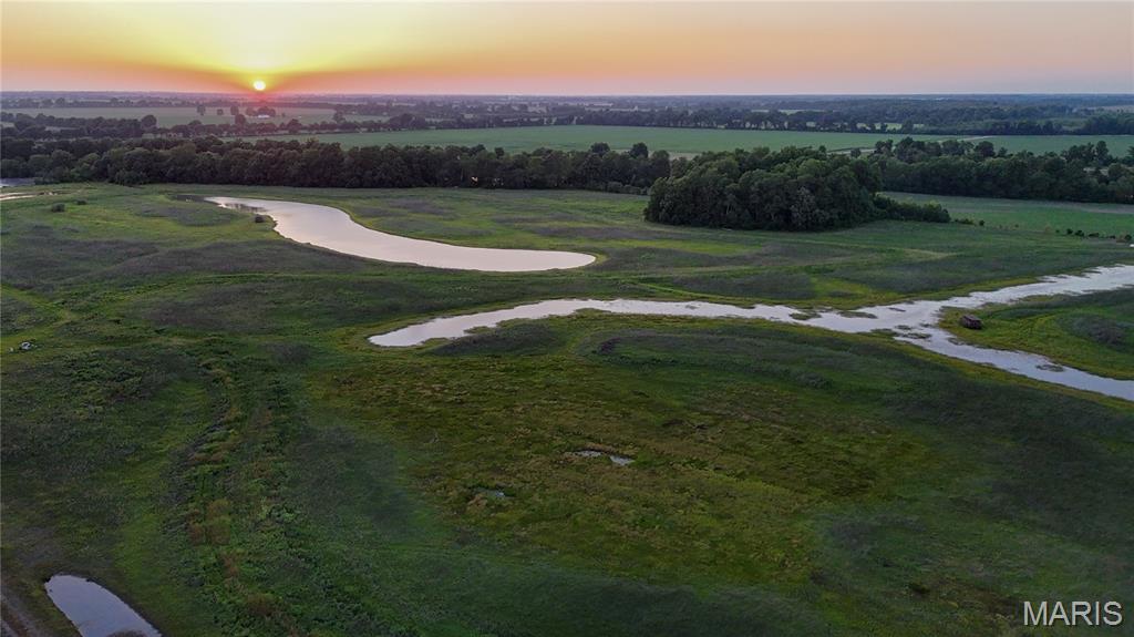 Turn-Key Waterfowl Tract: 83.17+/- Acres in the Heart of the Mississippi Flyway 

Location, Location, Location. Positioned less than 2 miles from the Mississippi River in New Madrid County, Missouri, this 83.17+/- acre tract sits squarely in one of the most productive waterfowl corridors in the Midwest. New Madrid County is legendary for holding massive concentrations of waterfowl every single winter. This is due to thousands of acres exceptional habitat, and proximity to historic waterways, ditches, and rivers that act as a highway for migratory waterfowl.   

This property offers an incredible opportunity to own a highly manageable, turn-key duck hole in close proximity to some of Southern Missouri's most renowned private clubs. It also sits in immediate striking distance of Ten Mile Pond Conservation Area, Long Point Refuge, Black Bayou Refuge, and the famed Reelfoot Lake.
 
In addition to being in a prime location, this property features multiple recent updates that have improved the hunting on the tract. Since being enrolled in WRE in 2020, several habitat projects have been completed including herbaceous and non-herbaceous plantings, as well as the instillation of critical water control structures. The centerpiece of this property's infrastructure is a newly installed 16-inch well. No more hoping for timely rains, this well allows you to quickly and efficiently flood the tract in just a few days of pumping. This ensures that when the leaves start changing colors and ducks start showing up, you will have water when it matters most.

This tract is being sold turn-key and is ready for opening day, featuring two floating blinds already strategically placed. Duck season will be here before we know it, call to set up a showing today!