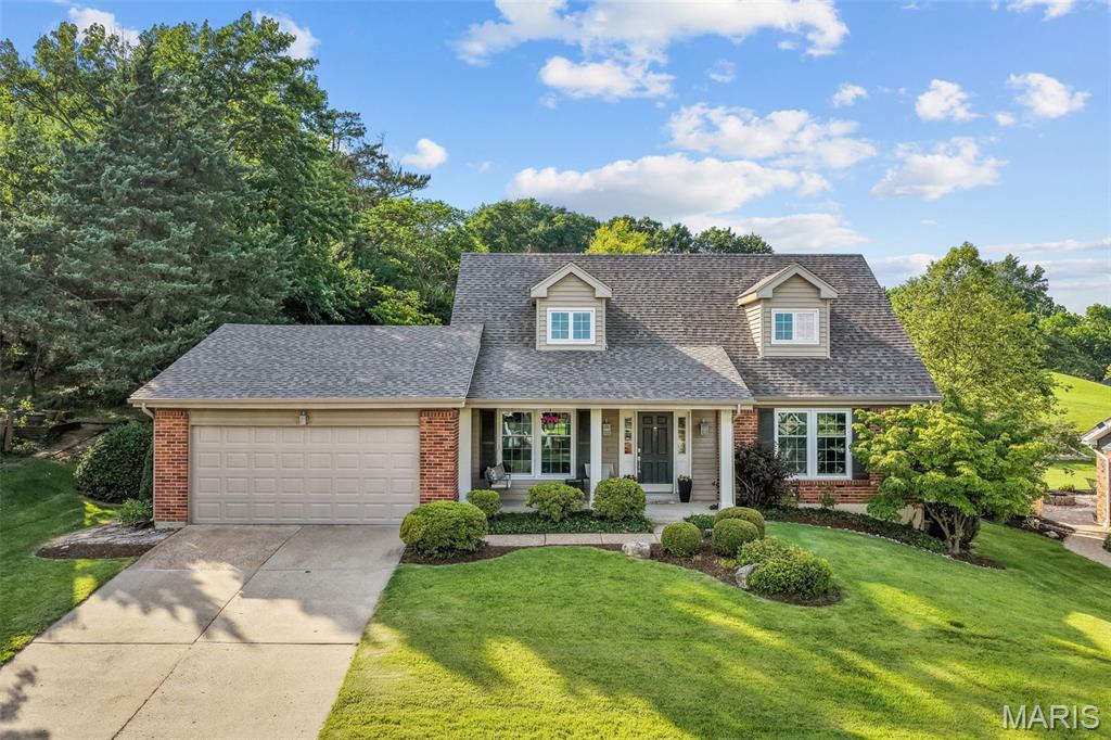 Meticulously maintained completely updated 1.5 story home in the sought after Dougherty Estates subdivision. Stunning hardwood flooring throughout the main living areas. Gorgeous updated kitchen with custom shaker cabinetry, granite countertops, breakfast bar and stainless steel appliances (remodeled in 2018). The Family room features beautiful built-in cabinetry and a gas fireplace. Crown molding, built-ins, wainscoting, window bench seat and bay window are just a few of the architectural details this home offers. Main floor primary suite with 2 walk-in closets and a lovely bathroom completely remodeled in 2018. Spacious main floor mud/laundry room. Finished lower level with a wet-bar, huge home office, game room and recreation room. The exterior features a large front porch, irrigation system, landscape lighting, spacious deck perfect for entertaining. Stunning stone landscaped staircase leading to the neighborhood common ground. Fantastic convenient location, twenty minutes to anywhere! Easy access to 141, 270, 44, 40/64. Walking Distance to award winning Barretts elementary School. New roof (2024).