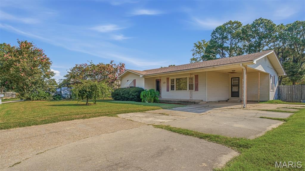 Take a look at this cozy 1200 Square foot home! Currently set up as a 2 bedroom 1 bath, with an option to convert the dining room into a 3rd bedroom!
Original hardwood floors in most of the house! This large fenced in backyard is going to be your new favorite hangout! The covered patio area is the perfect spot for grilling & relaxing. Also featuring an outbuilding & mature landscaping! Call today to take a look at this one in person!