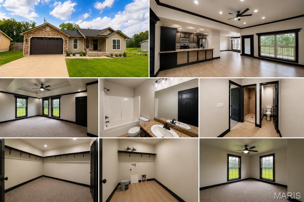 Check out this beautifully updated 3-bedroom, 2-bath home sits on approximately 0.42 acres m/l. Recent improvements include new flooring and fresh interior paint, giving the home a bright, move-in-ready feel. The open-concept living area flows into a spacious kitchen with abundant cabinetry, counter space, and a breakfast bar that's ideal for everyday living. The private primary suite features a tray ceiling, large windows overlooking the backyard, and a spacious en suite bath with a walk-in tile shower, double vanity, and ample storage. You'll also appreciate the split-bedroom floor plan, roomy secondary bedrooms, large laundry room, and attached two-car garage. Step outside to enjoy the covered back deck and peaceful backyard with plenty of space to relax or play. Conveniently located in Still Creek Crossing subdivision, this home is ready for its next owner.