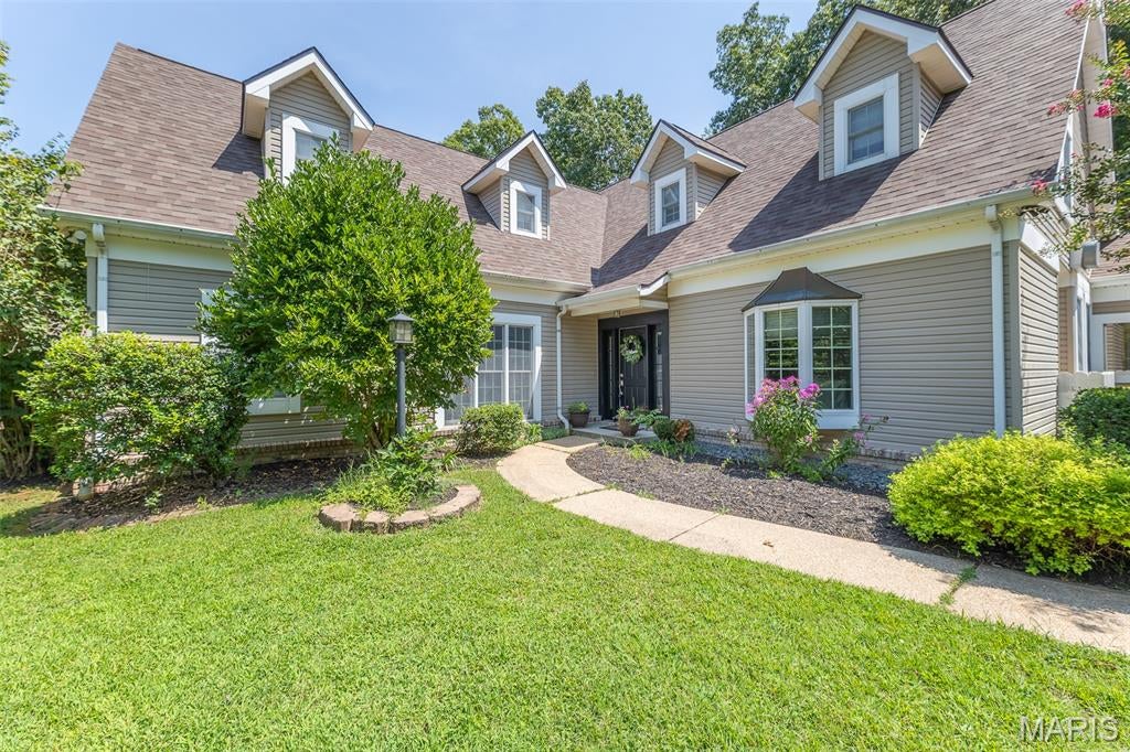 Welcome to a home where timeless elegance, character, and exceptional space come together beautifully. This impressive 4-bedroom, 4-bath home offers 4,322 sq. ft. +/- of thoughtfully designed living space in the desirable Crestwood Manor Subdivision, conveniently located within walking distance of the park. From the moment you arrive, the beautiful curb appeal sets the tone for what awaits inside. The spacious great room features soaring ceilings that create an open, impressive atmosphere, while the oversized kitchen offers an abundance of space for cooking and gathering. Updated flooring adds a fresh touch while complimenting the home's character and timeless features. Designed with versatility in mind, multiple levels provide plenty of room to spread out! Additional space above the 3-car garage can serve as a private bedroom, guests, home office, or retreat for older children-giving this home flexibility for nearly any lifestyle. Step outside to the screened in back deck, where a peaceful water feature creates the perfect setting for relaxing or entertaining. Adding even more value to this exceptional property is the detached shop, designed for both function and versatility. Equipped with a lift, bathroom, heating and cooled, plus an upstairs loft offering additional storage and dedicated office space this is far more than your average workshop!  With its generous living spaces, beautiful details, prime location, and undeniable curb appeal, this is a home that truly offers the best of comfort, character, and timeless style. A special property with the space and features to truly have it all!