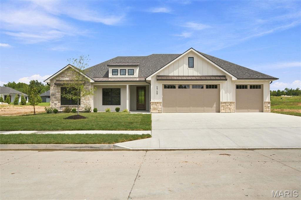 Showings start Wednesday, August 19th with a OPEN HOUSE on Thursday, August 20th from 5pm-7pm! 

Luxury build right here in the Rock Bridge School District! This 2,000+ sq. ft. ranch offers 4 bedrooms, a 3-car garage, a great-sized lot, and SO many beautiful finishes throughout!

The moment you walk in, you will appreciate the open feel, sturdy engineered flooring, nearly 11-foot ceilings, and those gorgeous oversized tinted windows across the living room overlooking the backyard!

And the kitchen is GOOD! You have a massive 10-foot island, granite countertops, gas range with a stylish vent hood, beautiful cabinetry, and plenty of space to gather. The walk-in pantry is another favorite with butcher-block countertops and seriously -- storage for days!

The primary suite is one you have to see! The bedroom is spacious with 9.5-foot ceilings, but the bathroom is where this one really shows off. You have a huge 9.5-foot quartz vanity with two sinks, tons of cabinet space, a great walk-in closet, AND an incredible 6.5' x 5.5' zero-entry tiled shower. It is definitely one of my favorite features of this home!

The laundry room is conveniently located right off the primary suite and flows into the mudroom with a built-in hall tree and even MORE storage. The additional bedrooms are all nicely sized with great closet space too!

Out back, you have a 17.5' x 13.5' covered patio overlooking the nice-sized backyard with a gas hookup already in place for your grill or add an outdoor gas fireplace and make it the perfect hangout spot!

Add in the 3-car garage, great lot, Rock Bridge schools, beautiful finishes, tall ceilings, oversized windows, and all that storage--this is a new construction home that just feels GOOD the minute you walk through the door. 

Right by Gans Creek Recreation Area and minutes from Rock Bridge Memorial State Park and its trail system! 

Come check it out!