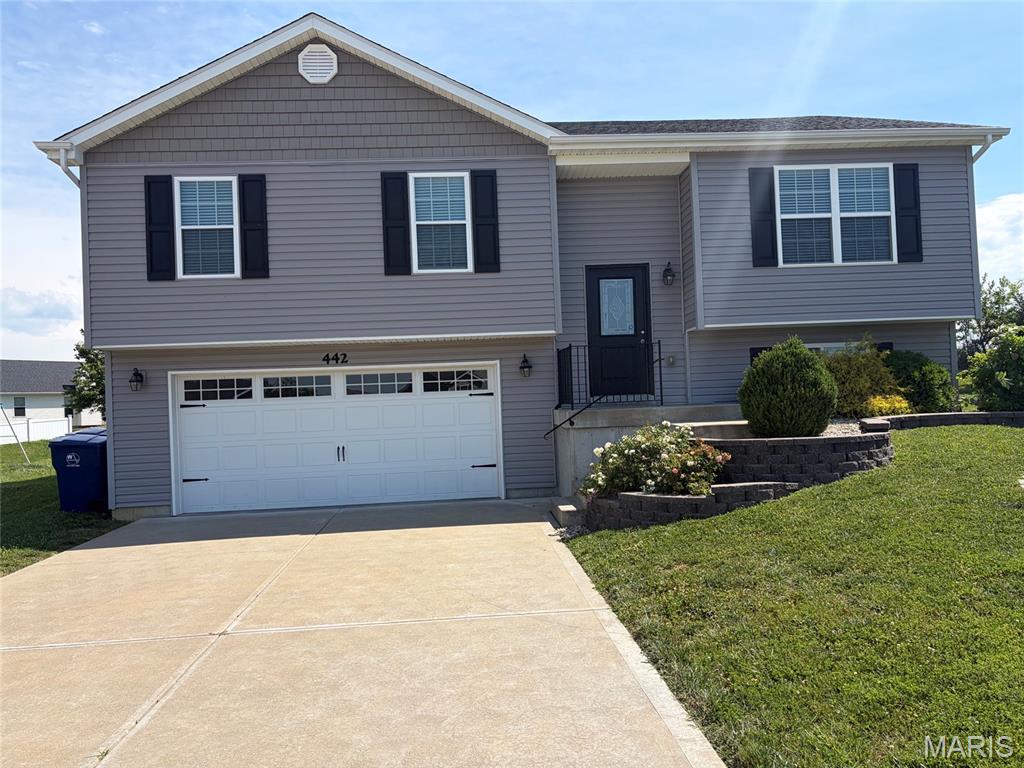 NEWER 4bed/3bath home with every upgrade you could imagine! They include vaulted ceilings, rounded corners, granite countertops, stainless steel appliances, maple cabinets with "soft close", ceramic tile (in kitchen, laundry, baths), center island, custom neutral colored paint job throughout, framed windows, taller baseboards, adult sized cabinets in bathrooms with marble countertops, walk-in closets, upgraded carriage doors, garage door openers, brick mailboxes, panel doors, and upgraded water/light fixtures throughout the house! MAIN floor laundry! HUGE Garage! 20x24 Patio! Backs to a farm! (Agent Owner)