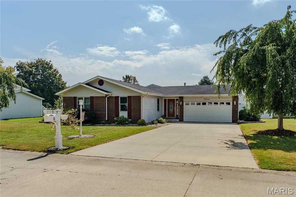 Beautifully appointed home on a quiet dead-end street with an incredible backyard oasis! Located just outside city limits, this spacious home offers a desirable split-bedroom floor plan, plenty of living space, and an impressive list of amenities.The exterior features an attached two-car garage, beautifully landscaped grounds, and a fully fenced backyard complete with an inground pool, patio, composite deck, and lofted shed. Sliding-door access provides convenient entry to the backyard, with access from both sides of the home—perfect for entertaining and enjoying the outdoors.Inside, you’ll find a welcoming formal dining room with wood flooring and a spacious eat-in kitchen featuring a breakfast bar, stainless steel appliances that stay, and two pantries for excellent storage. The great room is truly a highlight, featuring a large wood-burning stone fireplace with blower and wonderful views of the inground pool.The spacious primary suite offers a private retreat with his-and-her walk-in closets, a jetted tub, separate shower, and double vanity. Three additional generously sized bedrooms provide plenty of room for family, guests, or a home office. One of these bedrooms includes its own private full bath, while an additional full common bath serves the rest of the home. The main-floor laundry room includes a wash sink and abundant storage, plus a convenient toilet room. Thats right, FOUR toilets!! With that convenience, this home offers exceptional functionality for everyday living and entertaining.A large, clean unfinished basement provides abundant storage and plenty of potential for future finishing or additional living space.The washer and dryer stay as well. With its peaceful location, spacious interior, desirable split-bedroom layout, attached garage, inground pool, fenced yard, and extensive amenities, this home has a lot to offer!