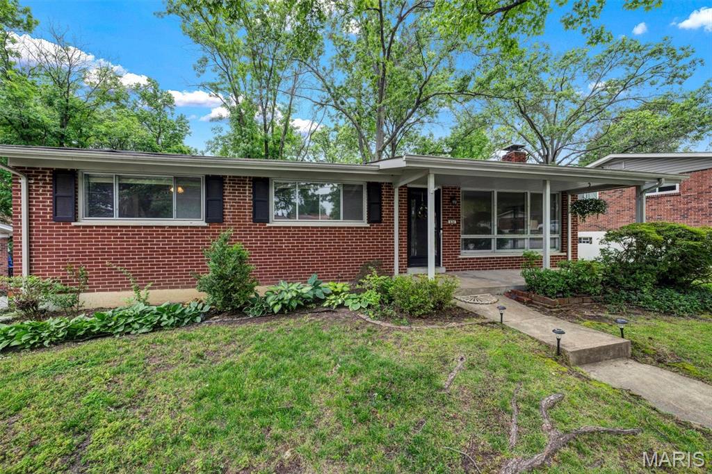 Well-maintained 3-bedroom, 2.5-bath ranch located in the desirable Lindbergh School District. This inviting home features an open floor plan that allows views from the living room into the separate dining area, creating a comfortable flow for everyday living and entertaining.

The kitchen offers abundant cabinet storage, stainless steel appliances, glass-front cabinets, and a dedicated coffee bar area. Sliding glass doors from the dining area lead directly to the outdoor deck, making indoor-outdoor entertaining easy and convenient.

The finished lower level provides additional living space with a spacious family room highlighted by a cozy woodburning fireplace, perfect for recreation, gatherings, or relaxing. A half bath is conveniently located off the attached one-car tuck-under garage at the rear of the home.

Enjoy outdoor living on the deck and a fantastic location close to shopping, dining, parks, and more. A great opportunity in a sought-after area!