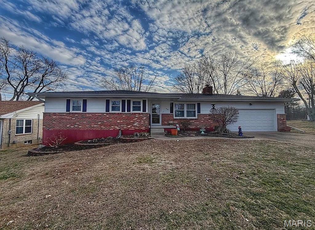 Beautifully maintained 4 bedroom 2.5 bath home situated on two lots offering space, comfort and versatility in a great Farmington neighborhood! The home features a finished walk-out basement, cozy gas log fireplace, and numerous updates including a new water heater, new gutters and gutter guards, and freshly painted basement and garage, Enjoy the convenience of a 2 car attached garage plus additional parking and workspace in the impressive 24x24 metal shop building equipped with pellet and natural gas heat, Perfect for hobbyists or car enthusiasts needing extra workspace and storage. The driveway to the shop is located on a separately deeded private lot that is included in the sale and conveyed with the home.