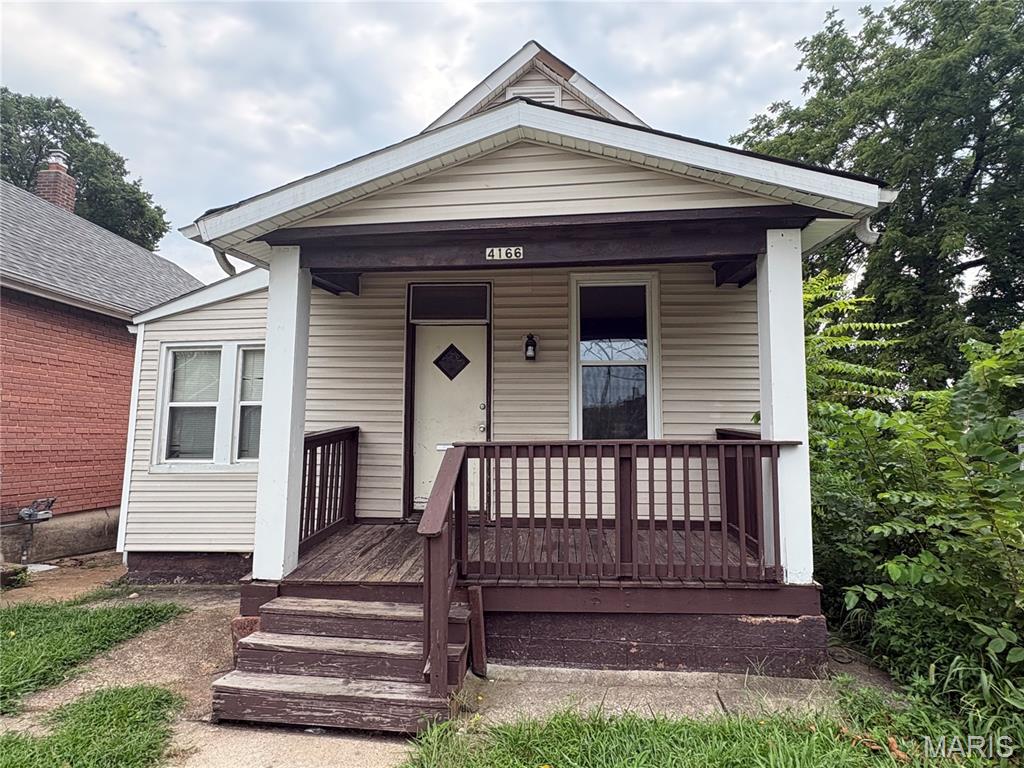 OUTSTANDING OPPORTUNITY!!! This Bevo beauty is sure to please!  Super clean and near ready to roll!  Newer siding, fenced yard and MORE!  Newer windows, great covered porch, and beautiful stained glass make this one a WINNER! Schedule a showing today! Property is to be sold in its current as-is condition with no warranties or representations by the Seller. Seller will not make repairs nor provide any inspections. Seller's addendum is required after terms of sale are agreed upon. Special Sale Contract (Form #2043) required. Proof of funds or pre-approval letter required with offer.