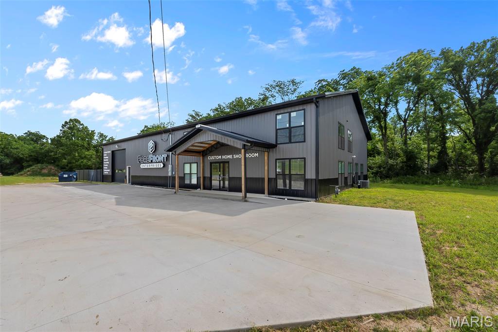 Exceptional opportunity to own a versatile 7,200 square foot warehouse in a prime, high visibility location. This well designed property offers approximately 2,400 square feet of finished showroom space, perfect for retail, client facing business operations, or office use, along with a spacious 3,600 square foot shop area built to handle a wide range of commercial or industrial needs. Upstairs, an additional 1,200 square feet has already been framed out and is ready to be finished as living quarters, expanded office space, or additional storage. The property also features two large garage doors for easy access and workflow, plus ample on site parking for employees, customers, and equipment. A rare opportunity with flexibility, functionality, and room to grow.