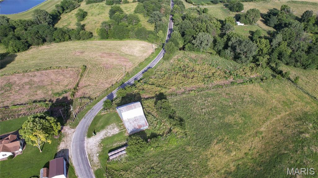 Offering the perfect blend of open ground, and wooded privacy, this 5.8+/- acre tract is full of potential. The property features a mix of tillable acreage and mature trees, creating an ideal setting for a future homesite, hobby farm, or recreational retreat.

A metal outbuilding is already in place, providing valuable storage for equipment, vehicles, tools, or outdoor gear. The combination of usable acreage and natural surroundings offers flexibility for a variety of uses while maintaining the peaceful feel of country living.

This parcel is being divided from a larger tract, and a survey is currently pending. Final acreage and legal description will be determined upon completion of the survey. Whether you're looking for a place to build, work, or simply enjoy the outdoors, this versatile property is ready for your vision.