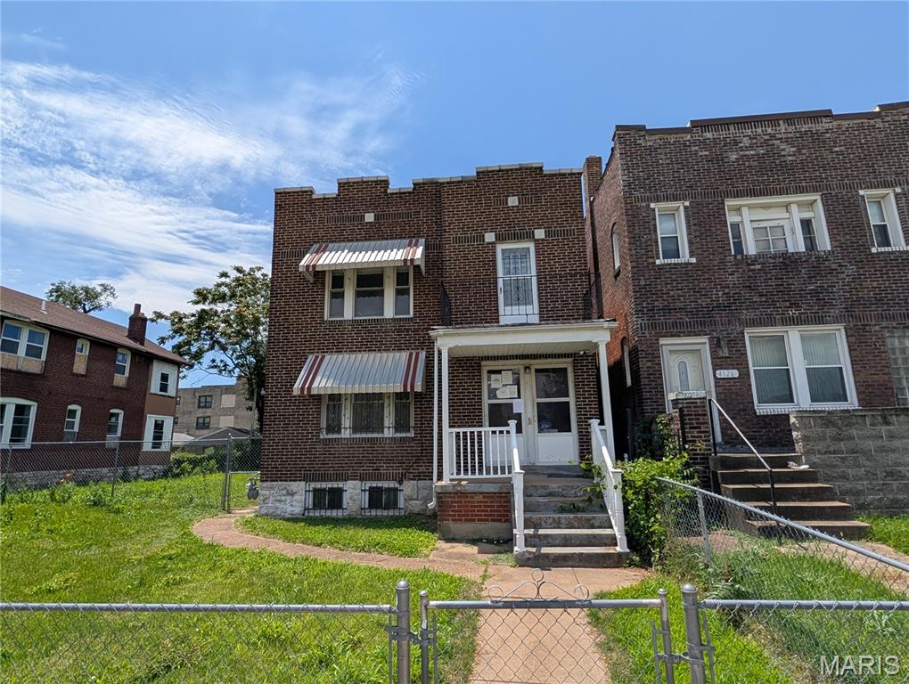 Amazing Opportunity with this Duplex.  Main level has a potential 2 bedrooms, 1 bath, living room area and kitchen area.  The upper level has a private entrance and a secure connected entrance on the main level.  The upper level is framed and ready for your finishing touches.  Full basement with HVAC & water heater.  Fenced yard with large parking area off the alley access.  Home is sold in current, as/is condition. Please write offers on Special Sales contract and Submit All offers to: www.Propoffers.com. CASH or LOCAL Bank conventional loan only