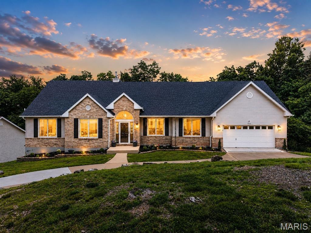 Gorgeous atrium ranch in a sought-after subdivision bordering Paradise Valley Golf Course!  Over 3,400 sq ft of total living area, 3 bedrooms, plus a dedicated office that could be a 4th bedroom, 3 full baths, 2 car garage, and a circular driveway with parking for multiple vehicles.
The main level showcases hardwood floors, some crown moldings, dedicated office space with French doors (possible 4th bedroom), a formal dining room with decorative recessed ceiling & niche, a vaulted great room overlooking the large atrium window includes a gas fireplace, and a spacious vaulted eat in kitchen featuring 42” cabinets, breakfast bar & NEW double oven/gas stove top. Just off the kitchen is the main floor laundry and a cozy covered deck for your morning coffee or watching all the wildlife. The primary bedroom boast vaulted ceiling, walk in closet and the en-suite includes dual sinks, a jetted tub, and separate shower. An additional bedroom & hall bath round out the main floor.
The finished lower level is a showstopper with 9’ ceilings, a wet bar, rec area, large family room with a brick fireplace, another bedroom, and full bath. BUT WAIT THERE IS MORE!!!:  there is storage in the HVAC room and a 21’ x 18’ bunker/storage room ....... all this walks out to the 2nd deck backing to trees for privacy. 
Additional features include New roof- gutter- downspouts in 2025, main floor has Anderson windows in 2022 (all except the atrium and palladium windows), Lower level window are from window direct new in 2025, HVAC heat pump 2024, NEW carpet in lower level, office, and all bedrooms in 2025. New doors to both decks. French drain system installed in driveway in 2025.  Trash & recycling are include in the HOA fee. Just minutes from Hwy 44  this home is filled with thoughtful details throughout.
A truly unique property offering elegance, comfort, and a peaceful setting in a prime location!