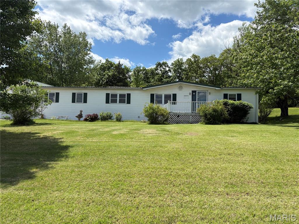 Have you been looking for your dream homestead property? Look no further! This stunning unrestricted 13.55-acre property checks all the boxes. Located on the property is a spacious 3 bed 2 bath mobile home with over 2000 square feet of possibilities. This mild fixer upper home boasts vinyl siding, a metal roof, and is just waiting on your finishing touches to make it into your dream home. Right next to the home you will find an expansive 2 car 34x24 detached garage with concrete floors perfect for your workshop. Outback you will find a 30x30 horse barn with 3 stalls and a tack/feed room with concrete floors. The property has a great mix of pasture to woods, making it suitable for raising livestock and providing you with great hunting opportunities. Pointers Creek Public Fishing Access to the Gasconade River is just a few mins down the road offering great fishing, swimming, and boating opportunities. Additional mobile home on property will be moved prior to closing.