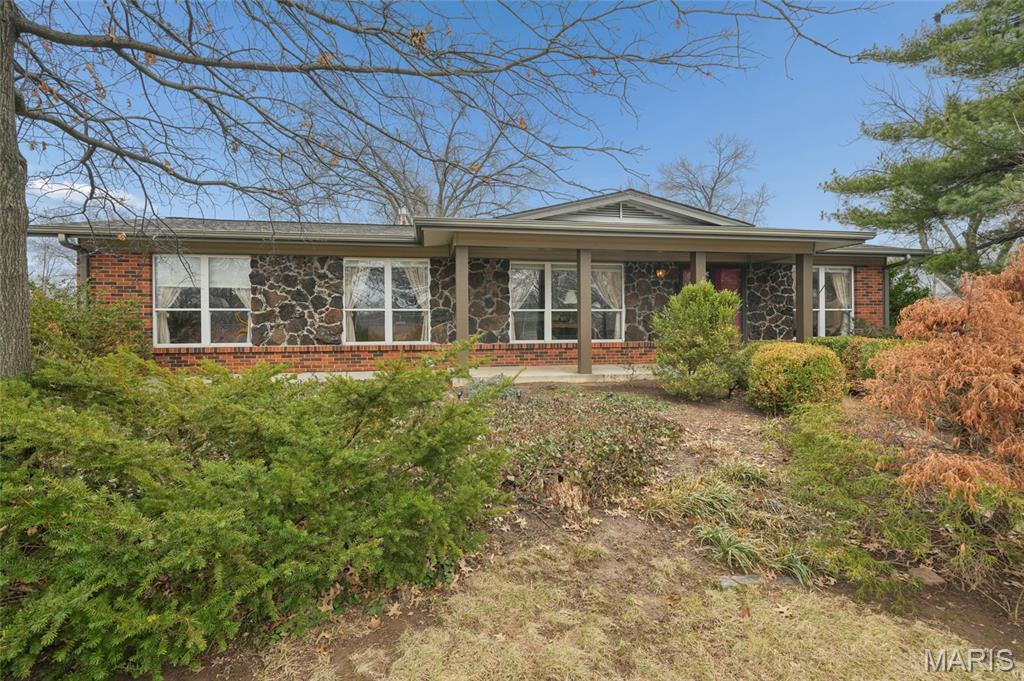 Fantastic opportunity in the highly sought after Lindbergh School District!  Lovingly maintained by its original owner, this home sits directly across from Grant's Farm, offering a truly unique setting.  This well-cared-for home offers timeless appeal and 1,539 sq ft of comfortable living space.  The marble foyer creates a striking first impression, while the beautiful hardwood floors create a warm and inviting feel throughout the main level.  The bright and airy formal living room features crown molding and attached custom shelving, adding both character and function.  The spacious family room flows into the kitchen, making it ideal for everyday living and entertaining, and includes a gas fireplace that serves as a cozy focal point.  Sliding glass doors provide direct access to the deck, perfect for relaxing or grilling.  This brick home includes 3 bedrooms, 2 full baths, plus a rough-in in the lower level offering future bathroom potential.  The lower level adds valuable space for a family room or recreation area, ample storage and laundry room.  The convenient side-entry driveway access to the attached two-car garage provides added parking.  Located just minutes from schools, parks, the library and shopping.  Move right in and make this home yours!