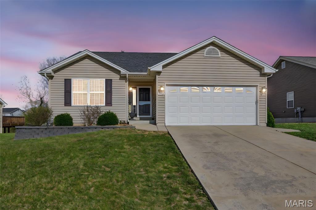 Welcome home to this beautifully maintained 3-bedroom, 2-bath ranch in a prime Wentzville location just minutes from shopping, dining, the GM plant, and easy highway access!

This move-in ready home features major updates, including a newer roof, water heater, and stainless steel appliances. The newer refrigerator, washer, and dryer are all included, making your transition effortless.
The open floor plan with vaulted ceilings has luxury vinyl plank throughout and a kitchen that boasts white cabinets, pantry and upgraded granite countertops.
The spacious primary suite offers a large walk-in closet and a private bath complete with a separate tub and shower. The current owner has upgraded to a luxurious walk-in tub with thermo-hydro jets, perfect for relaxing after a long day. Prefer a traditional tub? The space can easily be converted back to suit your needs.
The expansive lower level includes an egress window, providing the opportunity to add a fourth bedroom, home office, or additional living space.
Step outside to enjoy a fully fenced backyard that backs to common ground offering both privacy and a peaceful setting. Additional highlights include main floor laundry and a 2-car garage for added convenience.
With a quick closing available, you can be settled in and enjoying your new home by summer. Don’t miss this opportunity!