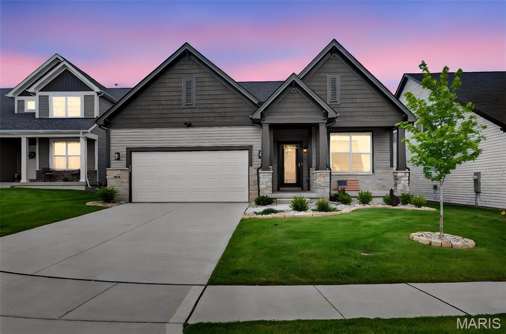 Seller has invested approximately $816,000 in home construction and post-closing improvements. Extensive upgrades include a Patriot four-season room, antimicrobial turf, epoxy garage floor, custom closet and pantry systems, premium appliance package (refrigerator, washer & dryer included), reverse osmosis system, and more. Seller is also offering a 1% buyer concession toward closing costs, rate buy-down, or other allowable expenses. Please ensure buyers review the attached upgrade sheet to fully appreciate the value offered.
Why wait months to build and spend tens of thousands on upgrades when it's already done for you? Thoughtfully finished far beyond typical builder offerings, this move-in ready residence delivers a level of comfort, quality, and completeness that would be difficult and significantly more expensive to recreate today. A soaring 11-foot ceiling highlights the open-concept great room, anchored by a contemporary electric fireplace with mounted television included. The designer kitchen features quartz countertops, a large center island, gas cooktop, premium appliances, and stylish backsplash, creating the perfect space for everyday living and entertaining. The showpiece of the home is the impressive Patriot four-season sunroom, a substantial investment complete with its own mini-split system for year-round comfort. This light-filled retreat seamlessly expands the home's living space and opens to a dedicated grilling deck for effortless indoor-outdoor entertaining. Additional upgrades include a private home office with French doors, engineered flooring throughout the main living areas, custom organizational systems in the pantry and primary closet, reverse osmosis system, epoxy-finished garage floor, and premium appliance package including refrigerator, washer, and dryer. Outside, the fully fenced backyard features antimicrobial turf, providing a beautiful, low-maintenance outdoor environment year-round. The unfinished lower level includes a bath rough-in and offers abundant opportunity for future expansion. Why buy new and start from scratch? This home offers the rare advantage of enjoying every major upgrade already completed, professionally installed, and ready for immediate enjoyment.