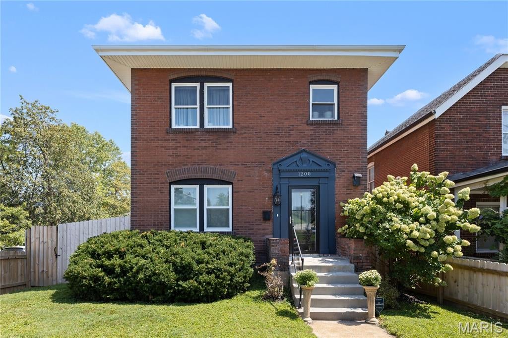 Welcome to 1200 McCausland Avenue, an extensively updated 1915 brick home in the desirable Hi-Pointe neighborhood, conveniently located near Clayton, Richmond Heights, Forest Park, major medical centers, restaurants, shopping, and more. Offering the character of a classic St. Louis home with meaningful modern improvements, this property recently passed its City of St. Louis occupancy inspection and is move-in ready.

Since 2024, substantial updates have been completed, including all-new energy-efficient windows throughout, a City-permitted sewer lateral from the basement to the alley, completely replaced and Spire-inspected gas lines, and a new furnace with updated, code-compliant venting. Additional exterior improvements include new soffit and gutters, a new front entry door and storm door, and two exterior water spigots.

At the rear of the home, an approximately 150-square-foot room addition completed. This versatile space features a wide staircase to the backyard and an oversized built-in pet door.

Inside, the original hardwood floors have been professionally refinished and stained, and the interior has been freshly painted. An arched opening between the living and dining rooms complements the home’s original architecture, while updated wiring, outlets, ceiling fixtures, and improved bedroom closets add everyday functionality. The clean, open basement provides abundant space for storage, hobbies, exercise equipment, or a workshop.

Outside, enjoy a fully enclosed privacy-fenced yard with gates on both sides, a secluded picnic area, and rear-gate access to two-car off-street parking. With major infrastructure updates already addressed, refreshed living spaces, a private yard, and an outstanding central location, this historic St. Louis home is ready for its next chapter.