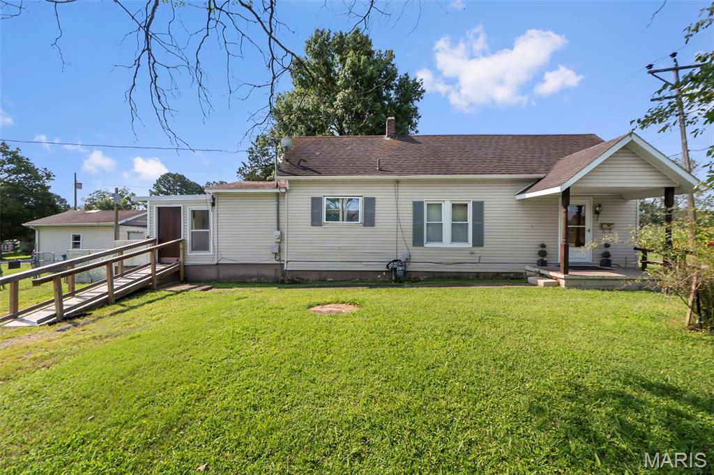 Step into the charm and simplicity of this 3-bedroom ranch nestled in a quiet Scott City neighborhood! Built in 1910 and situated on a spacious 10,454 sq ft corner lot, this 977 sq ft home offers a peaceful setting with beautiful views of neighboring cornfields. The generous side yard provides plenty of room for pets to roam, outdoor entertaining, gardening, or future possibilities such as a pool, garage, or additional shop.

Inside, you’ll find original real wood flooring in the living room, a spacious primary bedroom, an updated shower insert in the bathroom, and the convenience of a main-level laundry room. A covered sunroom adds versatile space to relax and enjoy the changing seasons.

Offered at just $95,000, this home is an excellent opportunity for a first-time buyer, downsizer, investor, or anyone looking for an affordable home in a convenient Scott City location. With its combination of character, functionality, generous lot size, and room to make it your own, this property is ready for its next chapter!