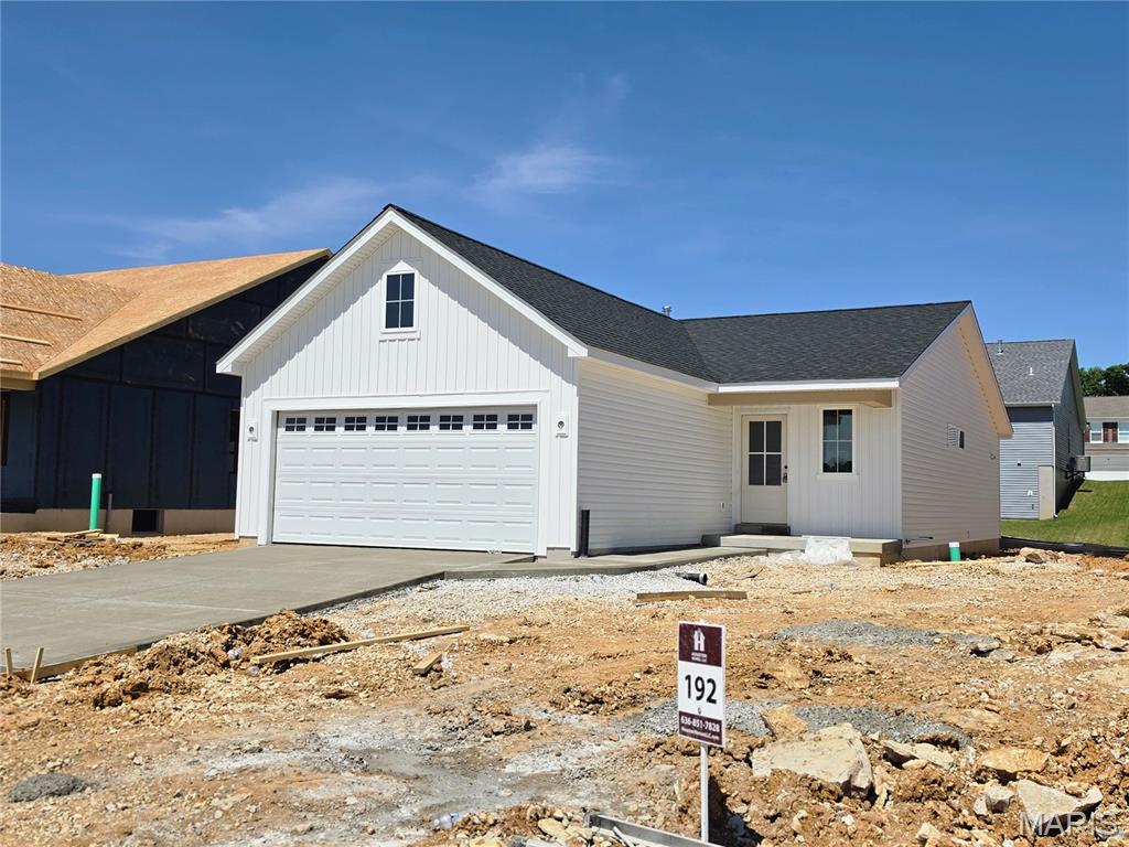 Beautiful new construction ranch home for sale in Wentzville, MO! Located at 206 Red Cliff Court in the desirable Estates at Huntleigh Ridge community, this "Tulip" floorplan by Houston Homes, LLC offers 1,450 sq. ft. of efficient, modern living. Boasting premium curb appeal, the upgraded exterior features vertical and DutchLap siding, cedar Board ’n Batten shutters, and an upgraded 2-car garage. Inside, the open-concept great room and café area shine with durable laminate flooring. The chef’s kitchen features 39" premium soft-close cabinets, a matte black pulldown faucet, and a stainless steel GE appliance package. The main floor offers a convenient double-bath layout, including an owner's suite with a Gibson Posi-Temp shower and brushed nickel finishes.
 Maximize your living space with the 8' in-grade basement, boasting a professionally finished lower level with a 3rd bedroom, a 3rd full bath, and a dedicated laundry room.
 
Perfectly situated in St. Charles County, this move-in-ready home is just minutes from North Point High School, North Point Middle School, and is zoned for Wabash Elementary. Experience the quality of Houston Homes standard features at an incredible value. Schedule your tour today!