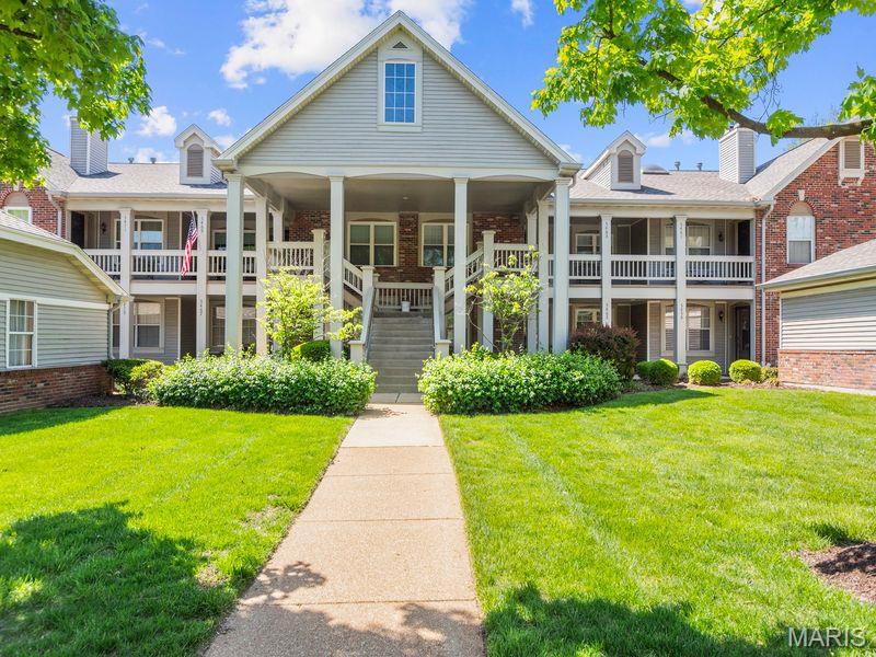 SIMPLY STUNNING!! Completely renovated ground level condo in Kenrick Parke!  From the covered front porch enter the foyer to see brand new hardwood floors stretching throughout this unit.  The living room offers a stylish gas fireplace and leads to the dining area and on into the fully remodeled kitchen.  You will be greeted with lots of custom cabinets, all stainless appliances,  center island with seating, solid surface counters and pantry.  Off the kitchen you will find a lovely covered deck for your outdoor enjoyment.  Back down the hall from the dining area is the vast primary suite with large closets and an exquisite bath remodel including double sink, custom step-in shower and so much more.  This level is completed by the second and third bedrooms, beautifully remodeled hall bathroom and main floor laundry room.  The walkout lower level is finished and offers an additional 630+ sq.ft. of open living space along with a generous storage area and private patio outside the sliding doors.  From the lower level you enter your oversized 2-car garage that offers brand new garage doors and openers.  You will enjoy the community pool and tennis courts and close proximity to shopping, dining and entertainment.   No detail missed - come see your new home.  NOTE:  Chair lift in lower level storage room can be included in sale.