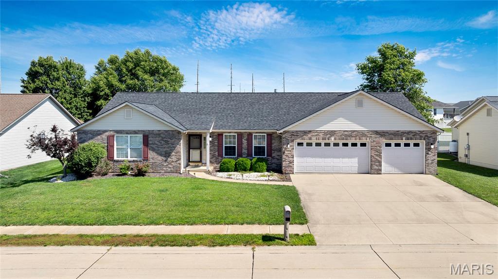Welcome home to this stunning 4 bedroom, 2 bathroom brick front ranch home offering nearly 2,150 square feet of beautifully designed living space in Waterloo! From the charming front porch to the incredible backyard oasis, this home delivers the style  and functionality that today's buyers are looking for.
Step inside and immediately feel at home in the spacious family room, featuring avaulted ceiling and a cozy corner fireplace, the perfect gathering spot for family and friends. The well appointed kitchen is sure to impress, boasting a center island, tile backsplash, ample cabinet storage, and a convenient pantry to keep everything organized. The bright and welcoming breakfast area is bathed in natural light and features sliding glass doors that open seamlessly to the incredible backyard, perfect for indoor/outdoor living and entertaining!
Step outside and discover your own private oasis! The fully fenced backyard is an entertainer's dream, complete with a sparkling in-ground pool and a covered patio, the perfect setting for summer gatherings, lazy afternoons, and everything in between! 
The spacious primary bedroom suite is a true retreat, featuring his and hers closets and a private attached bathroom. Three additional well-sized bedrooms, a second full bathroom, and a dedicated laundry room round out this thoughtfully designed main level, keeping everything convenient and within easy reach.
With its fantastic layout, beautiful finishes, and incredible outdoor living space, this home truly has it all. Schedule your private showing today before it's gone!