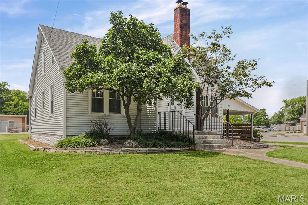 Welcome home to this charming 3-bedroom, 2-bath home in the heart of Carlyle, offering over 2,300 square feet of comfortable living space with room for everyone. Inside, you'll find a spacious layout featuring a welcoming living room, cozy family room, formal dining room, dedicated office, and a bright sunroom perfect for relaxing year-round.    This home has been thoughtfully updated with a new roof and gutters (2025), new dishwasher (2025), updated electrical (2023), new laminate flooring (2024), and new ceiling fans throughout. Brand-new carpet in the bedrooms is scheduled for installation on August 17, 2026, giving the new owners fresh flooring to enjoy from day one.    Outside, you'll appreciate the large, partially fenced backyard with plenty of space for entertaining, gardening, or play. Pet owners will love the underground dog fence, and the sellers are including the dog collars for added convenience.    Additional features include an unfinished basement offering abundant storage or future finishing potential, a carport, and an impressive 4-car garage, providing plenty of room for vehicles, hobbies, or a workshop.    With its generous living space, numerous updates, and fantastic amenities, this Carlyle home is ready for its next owners. Schedule your showing today!