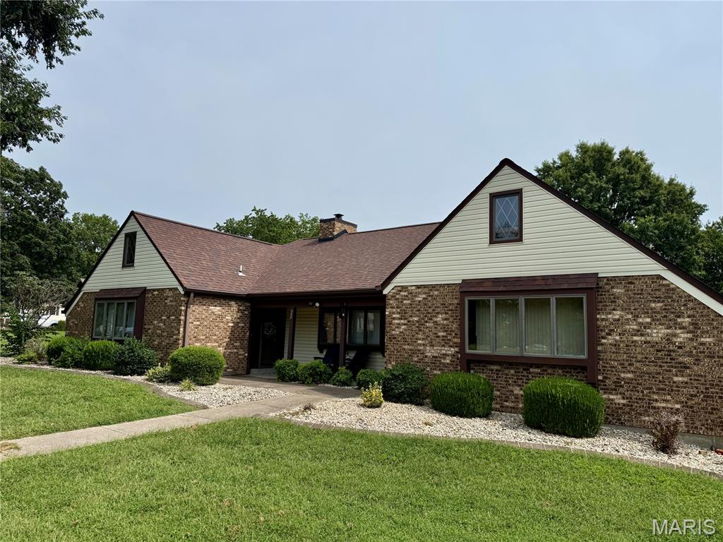 Welcome home to this beautiful, timeless brick ranch that blends classic charm with modern living. Located in a desirable neighborhood, this 3 bedroom, 2 bath gem offers single level living with an open concept design. Step through the foyer into a large family room featuring elegant crown molding, sleek recessed lighting, a cozy fireplace and an integrated dining area, perfect for gatherings. The fluid transition between the family room and the kitchen creates a welcoming environment. The kitchen features custom cabinetry, quartz countertops, a spacious center island and a coffee bar - perfect for a cup of morning brew or evening entertaining. The functional laundry room connects the kitchen and garage. This dedicated space has a utility sink, cabinetry and a convenient storage closet. The master bedroom is complete with a private bath that includes a walk in shower. Two additional bedrooms offer versatility for families, guests or a home office. The second full bath includes a cultured marble tub/ shower combo with glass doors. Unwind outside on the two tiered patio ideal for outdoor dining and entertaining. Additionally this home is equipped with an attic fan to help keep the home naturally cool during the warm months. Don't miss out on this well maintained home. Schedule your showing today!!