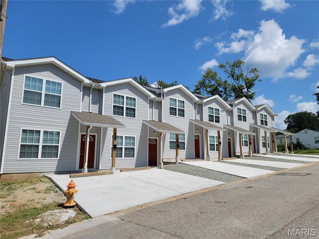 Brand new 2 Story Townhomes with some off street parking.  All units have their own front and rear entrance with patio.  Rent includes water, sewer, and trash and lawncare.  Tenant pays electric only.  Deposit 1600 Rent 1600.  Units have living room, kitchen, half bath and utility room on main floor and 2 bed 1 bath and laundry room on second floor.  Free Application must be submitted prior to viewing by all occupants over the age of 17.  We do not accept housing vouchers on this home.