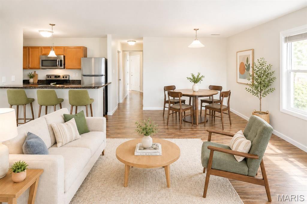 Beautiful 2 bed/2 bath second floor Georgetown Park condo with 1 car over-sized garage and large storage space. The open floor plan features living/dining combo and galley kitchen with breakfast bar, granite countertops, and stainless steel appliances. The primary bedroom includes a full bath, walk-in closet, and sliding glass door to private balcony. The laundry room comes with washer & dryer. There is a large storage room (10×15) and over-sized (21’x11') 1 car private garage with opener in basement. This home is pet friendly with a $200 pet fee & $30/month pet rent per pet and features a community dog park. Tenant responsible for electric, sewer, and gas. Security deposit equal to one month’s rent.