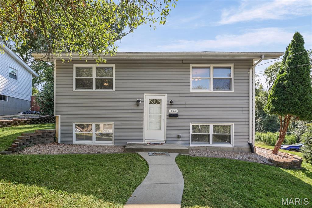 Welcome home to this beautifully updated 3-bedroom, 2-bath home situated on a spacious .43-acre lot in one of Edwardsville’s most convenient locations. Just minutes from downtown Edwardsville, the Watershed Nature Center, Hoppe Park, and bike trails, this property offers the perfect combination of modern comfort, outdoor enjoyment, and everyday convenience. Step inside and you’ll immediately appreciate the fresh, inviting feel of this thoughtfully updated home. LVP flooring runs throughout the entire home, complemented by fresh paint, updated fixtures, and an abundance of natural light. The comfortable layout provides plenty of space for everyday living while maintaining a warm and welcoming atmosphere. The updated kitchen features newer cabinetry, stainless steel appliances, ample storage, and generous prep space. Whether you’re preparing a quick weeknight meal or entertaining friends and family, this kitchen offers the functionality and style you’re looking for. Three spacious bedrooms provide plenty of room for family, guests, a home office, or whatever fits your lifestyle. Both bathrooms have been updated, adding to the home’s move-in-ready appeal and allowing you to settle in without taking on a long list of projects. Outside, the spacious .43-acre lot offers something you don’t often find this close to downtown—**room to spread out.** The property provides ample parking with plenty of space for larger vehicles, trailers, campers, boats, or recreational equipment. There’s also room to explore the possibility of adding a garage, workshop, or other outbuilding to suit your needs (buyer to verify applicable zoning and requirements). The generous yard provides additional space to relax, entertain, garden, or simply enjoy having room to breathe. And when you’re ready to explore, you’re just minutes from shopping, dining, recreation, parks, trails, and all that Edwardsville has to offer. Beautifully updated, conveniently located, and loaded with possibilities—this is one you’ll want to see!