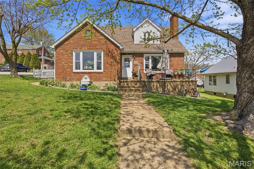 A turnkey brick home in the heart of Missouri wine country.

Set on a corner lot just one block from Hermann Elementary and within walking distance of City Park or Stone Hill Winery, this solid 1950 brick home has been carefully maintained and run as a successful guest rental for the past eleven years. It offers 2,200 square feet above grade — five bedrooms and two full baths — plus a partially-finished walk-out lower level that adds roughly 1,500 square feet of flexible space.

Inside, the kitchen and bathrooms have been updated, and radiant floor heating keeps the home comfortable and efficient through every season. A whole-house water filtration system with reverse-osmosis drinking water means clean water at every tap. The walk-out basement — nine-foot poured walls, bath already stubbed — is ready to become guest quarters, a rec room, a workshop, or a home gym, and includes an attached garage area.

Outside, three separate patio and deck areas give you room for morning coffee, evening dinners, and everything in between, with a storage shed for tools and seasonal gear. Hermann draws visitors year-round to its wineries, festivals, and historic riverfront, and this property is a rare find in one of Missouri's most charming towns.