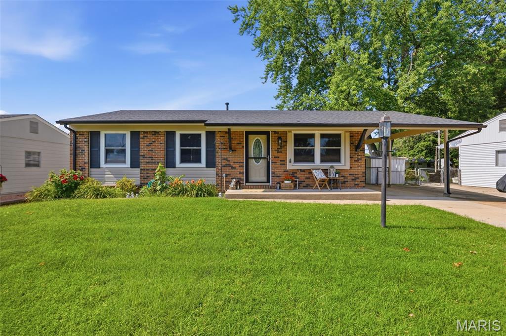 Welcome to this charming ranch-style home featuring three bedrooms and one full bathroom. Inside, you'll find a family room, with an eat-in kitchen and a side exterior door leading to the one-car carport, extra wide driveway, covered patio and fenced yard. Shed also offers extra storage. During seller's ownership, they replaced the roof, vinyl siding, gutters, windows, HVAC, kitchen appliances, water heater and driveway all within the past 5 years!  No need to worry about the big items!  Just add your personal touches to this cute move-in ready home! The basement has a finished recreational room, laundry with a washer and dryer, along with plenty of storage.  Home is being sold as-is.  Schedule your showing today! Showing to begin Saturday 6/27. Photos to be uploaded Friday 6/26.